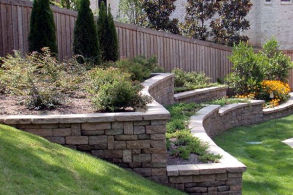 layered-stone-wall-borders-garden