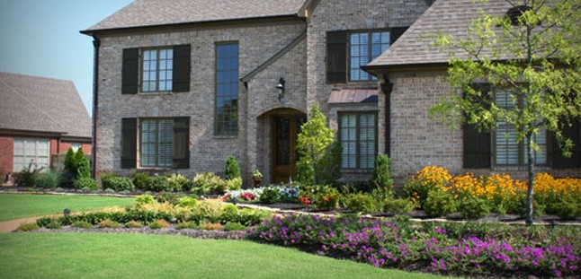 Large office building showing results of a commercial lawn & landscape maintenance program.
