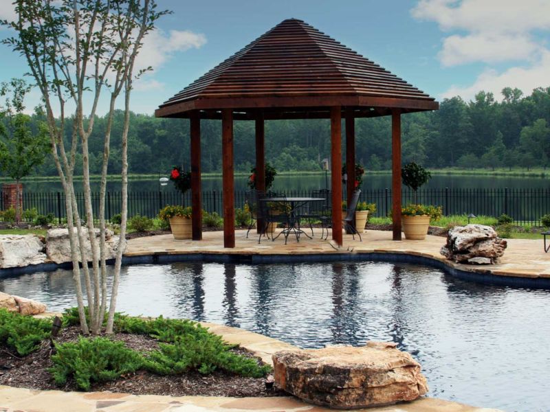 Beautiful landscaped pool house and gazebo.