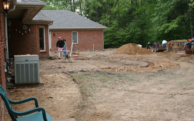 Landscape drainage installation at the work site.